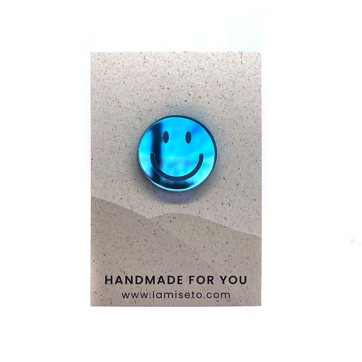 Smiley pin